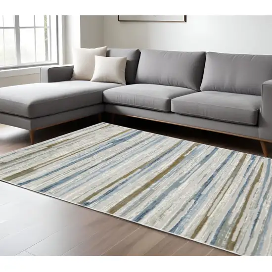 Grey Blue Ivory Brown Beige And Navy Abstract Power Loom Stain Resistant Area Rug Photo 1
