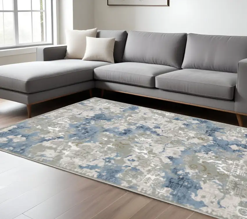 6' X 9' Grey Blue Ivory Navy Beige And Brown Abstract Power Loom Stain Resistant Area Rug Photo 1