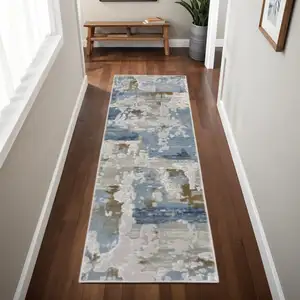 Photo of Grey Blue Navy Ivory And Brown Abstract Power Loom Stain Resistant Runner Rug