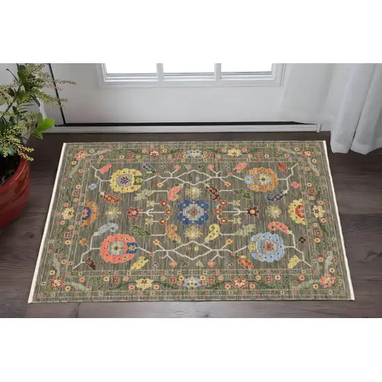 Grey Blue Pink Orange Rust Red Green And Ivory Oriental Power Loom Stain Resistant Area Rug With Fringe Photo 1