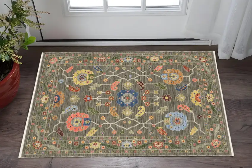 Grey Blue Pink Orange Rust Red Green And Ivory Oriental Power Loom Stain Resistant Area Rug With Fringe Photo 1