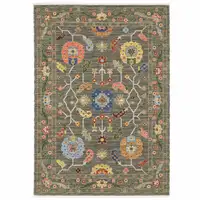 Photo of Grey Blue Pink Orange Rust Red Green And Ivory Oriental Power Loom Stain Resistant Area Rug With Fringe
