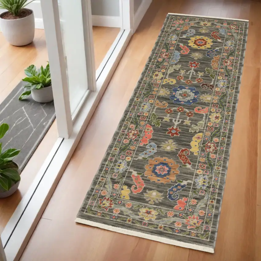 2' X 6' Grey Blue Pink Orange Rust Red Green And Ivory Oriental Power Loom Stain Resistant Runner Rug With Fringe Photo 1