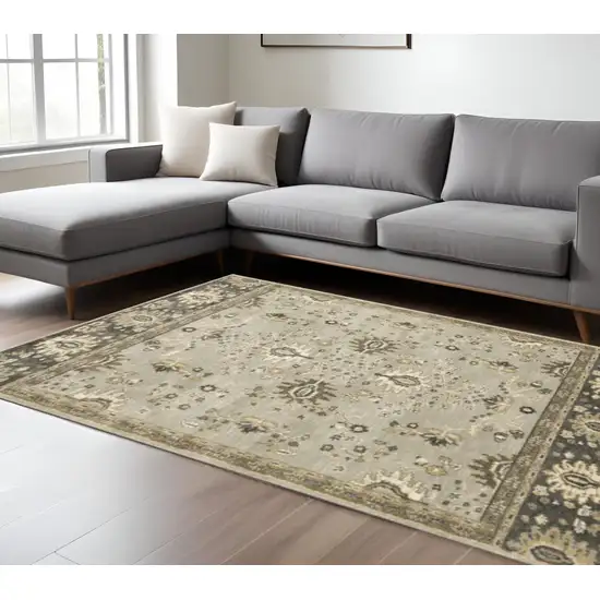 6' X 9' Grey Brown Tan And Beige Oriental Power Loom Stain Resistant Area Rug Photo 1