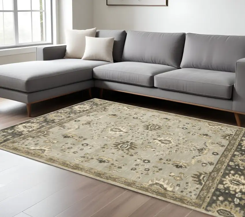 6' X 9' Grey Brown Tan And Beige Oriental Power Loom Stain Resistant Area Rug Photo 1