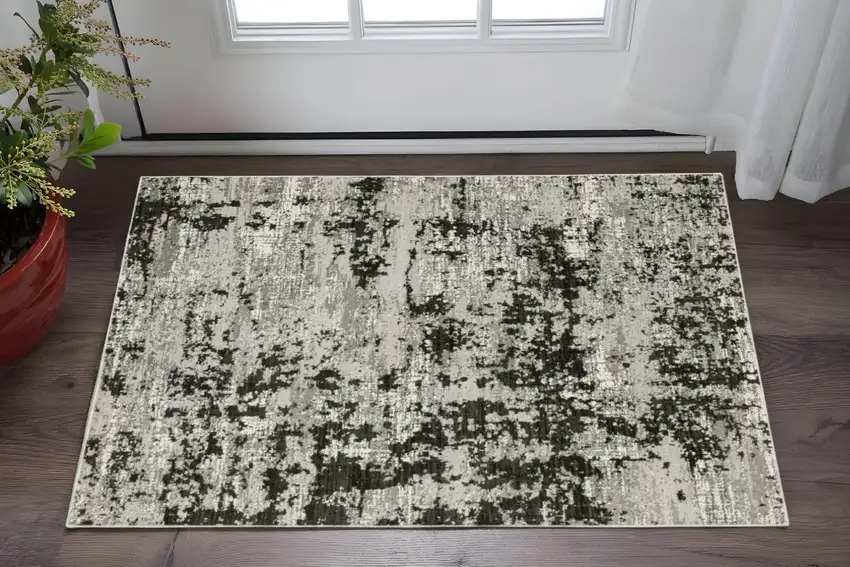 Grey Charcoal Black And Ivory Abstract Power Loom Stain Resistant Area Rug Photo 1