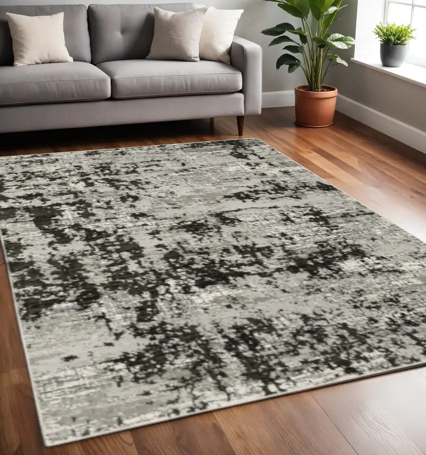 Grey Charcoal Black And Ivory Abstract Power Loom Stain Resistant Area Rug Photo 1