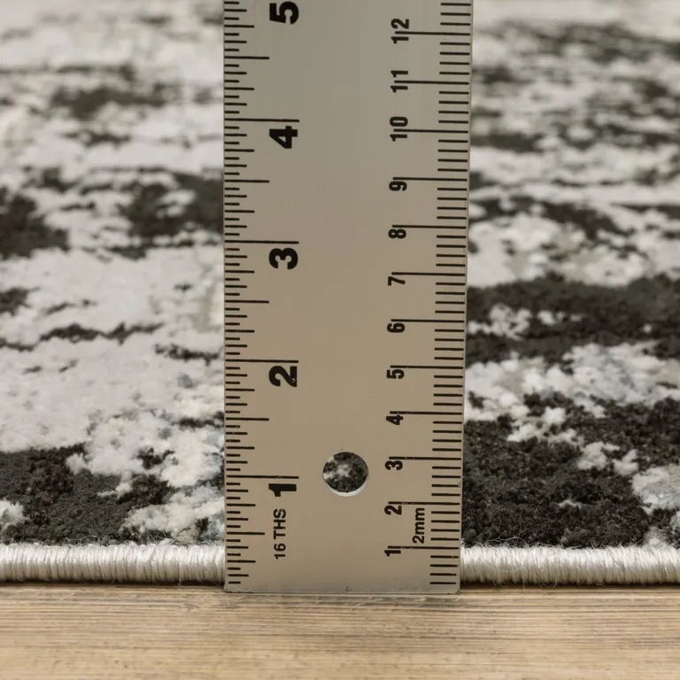 Grey Charcoal Black And Ivory Abstract Power Loom Stain Resistant Area Rug Photo 1