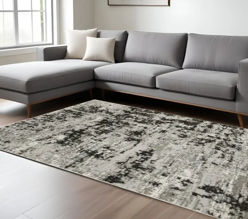 Grey Charcoal Black And Ivory Abstract Power Loom Stain Resistant Area Rug Photo 1