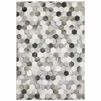 Photo of Grey Charcoal Brown Tan And Ivory Geometric Power Loom Stain Resistant Area Rug
