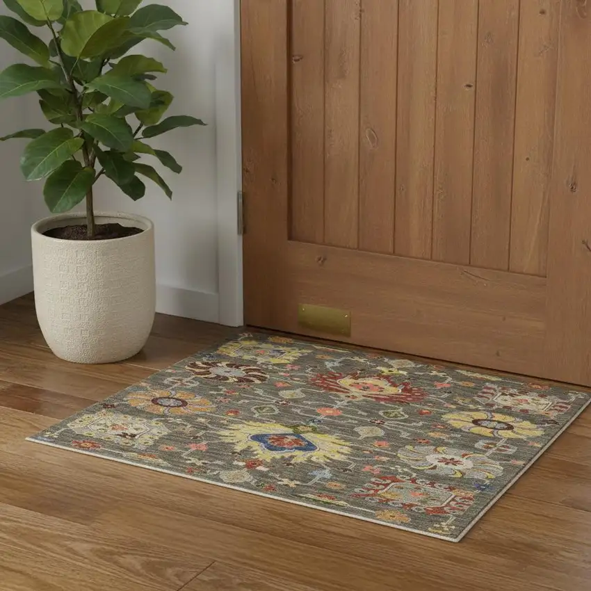 Grey Charcoal Yellow Blue Rust Red Pink Green And Ivory Oriental Power Loom Stain Resistant Area Rug With Fringe Photo 1