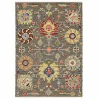 Photo of Grey Charcoal Yellow Blue Rust Red Pink Green And Ivory Oriental Power Loom Stain Resistant Area Rug With Fringe