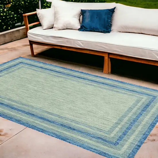 8'X11' Grey Denim Machine Woven Uv Treated Bordered Indoor Outdoor Area Rug Photo 1