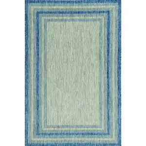 Photo of Grey Denim Machine Woven UV Treated Bordered Indoor Outdoor Area Rug
