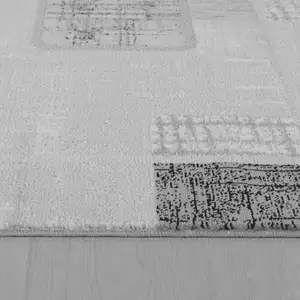 Photo of Grey Geometric Area Rug