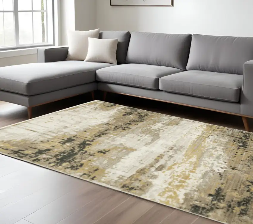 Grey Gold Black Charcoal And Beige Abstract Power Loom Stain Resistant Area Rug With Fringe Photo 1