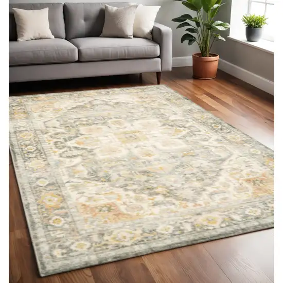 Grey Gold Orange And Ivory Oriental Power Loom Stain Resistant Area Rug Photo 1