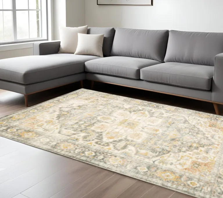 Grey Gold Orange And Ivory Oriental Power Loom Stain Resistant Area Rug Photo 1