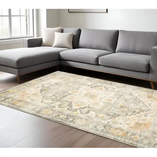 Grey Gold Orange And Ivory Oriental Power Loom Stain Resistant Area Rug Photo 1
