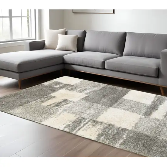 6' X 9' Grey Ivory And Silver Geometric Shag Power Loom Stain Resistant Area Rug Photo 1