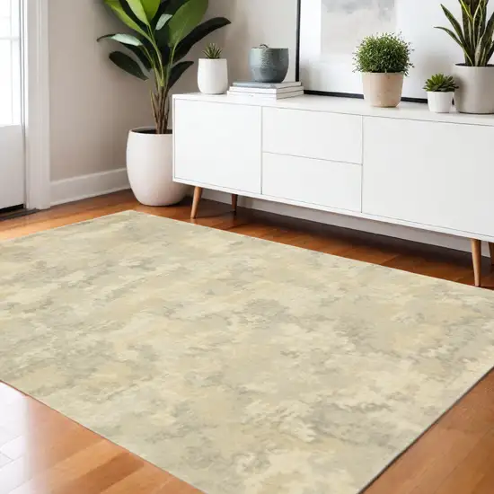3' X 5' Grey Ivory Beige And Taupe Abstract Power Loom Stain Resistant Area Rug Photo 1