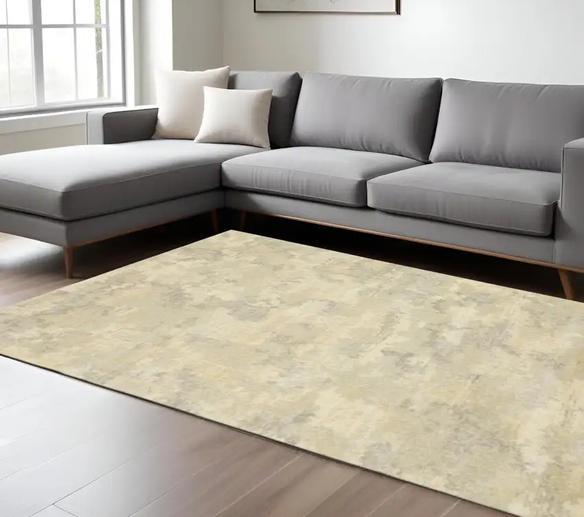 6' X 9' Grey Ivory Beige And Taupe Abstract Power Loom Stain Resistant Area Rug Photo 1