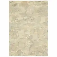 Photo of Grey Ivory Beige And Taupe Abstract Power Loom Stain Resistant Area Rug