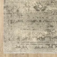 Photo of Grey Ivory Beige And Taupe Oriental Power Loom Stain Resistant Area Rug