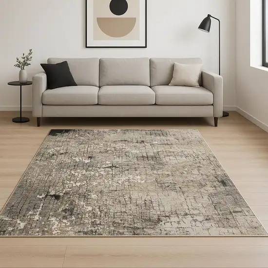 6' X 9' Grey Ivory Beige Charcoal Black Tan And Brown Abstract Power Loom Stain Resistant Area Rug Photo 1