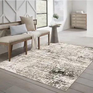 Photo of Grey Ivory Beige Charcoal Black Tan And Brown Abstract Power Loom Stain Resistant Area Rug