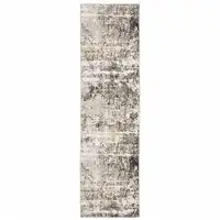 Photo of Grey Ivory Beige Charcoal Black Tan And Brown Abstract Power Loom Stain Resistant Runner Rug