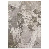 Photo of Grey Ivory Beige Tan Brown And Black Abstract Power Loom Stain Resistant Area Rug