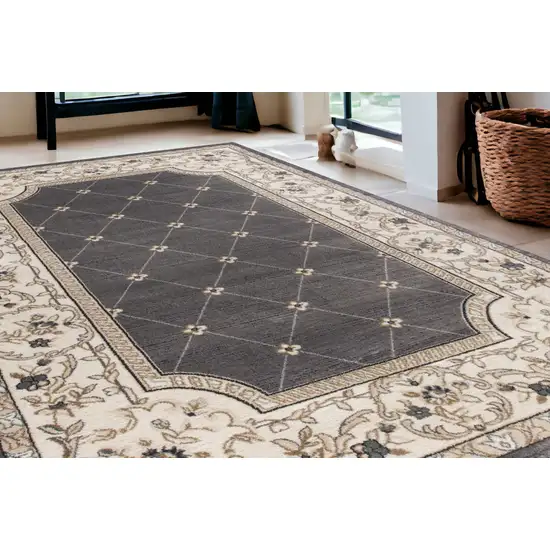 5'X8' Grey Ivory Bordered Floral Indoor Area Rug Photo 1