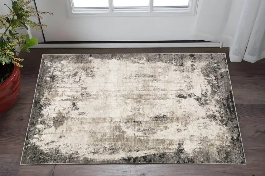 Grey Ivory Charcoal Tan Black And Beige Abstract Power Loom Stain Resistant Area Rug Photo 1