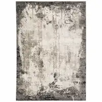 Photo of Grey Ivory Charcoal Tan Black And Beige Abstract Power Loom Stain Resistant Area Rug