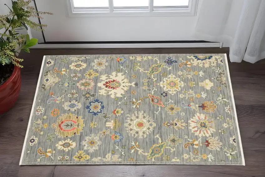Grey Ivory Gold Salmon Red Blue And Green Oriental Power Loom Stain Resistant Area Rug With Fringe Photo 1