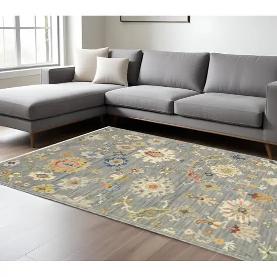 Grey Ivory Gold Salmon Red Blue And Green Oriental Power Loom Stain Resistant Area Rug With Fringe Photo 1