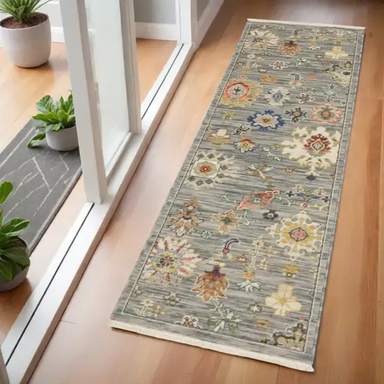 2' X 6' Grey Ivory Gold Salmon Red Blue And Green Oriental Power Loom Stain Resistant Runner Rug With Fringe Photo 1