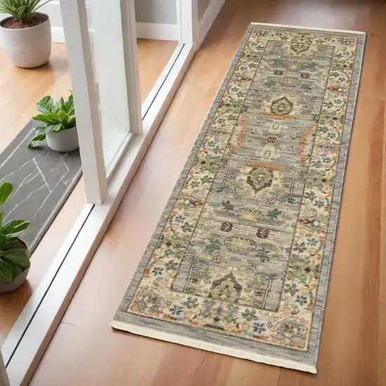 2' X 6' Grey Ivory Orange Teal Green Charcoal Blue And Red Oriental Power Loom Stain Resistant Runner Rug With Fringe Photo 1