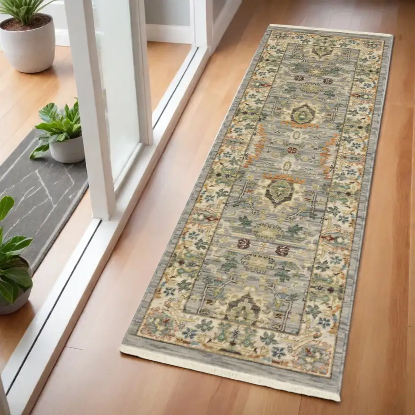 2' X 6' Grey Ivory Orange Teal Green Charcoal Blue And Red Oriental Power Loom Stain Resistant Runner Rug With Fringe Photo 1