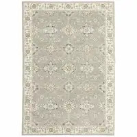 Photo of Grey Ivory Tan Brown And Gold Oriental Power Loom Stain Resistant Area Rug