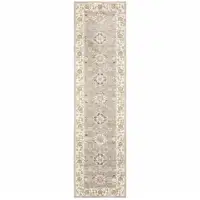 Photo of Grey Ivory Tan Brown And Gold Oriental Power Loom Stain Resistant Runner Rug