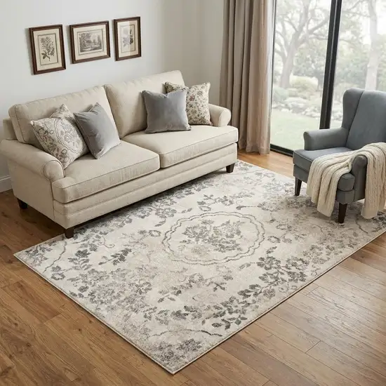 Gray And Tan Floral Distressed Area Rug Photo 1