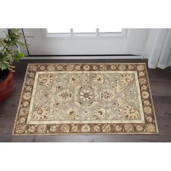 Gray Brown And Ivory Wool Floral Medallion Hand Tufted Area Rug Photo 1
