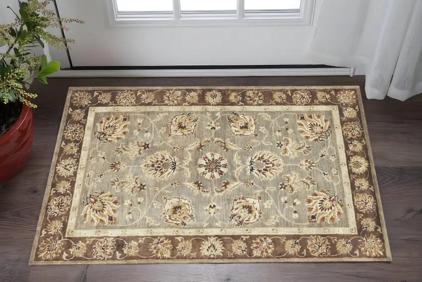 Gray Brown And Ivory Wool Floral Medallion Hand Tufted Area Rug Photo 1