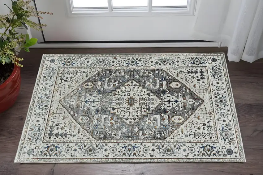 Gray Brown And Teal Floral Medallion Area Rug Photo 1