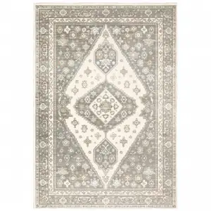 Photo of Grey Pink And Brown Oriental Power Loom Stain Resistant Area Rug