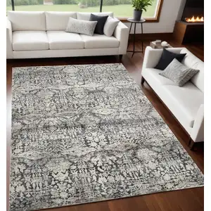 Photo of Grey Polyester or  Viscose Rug