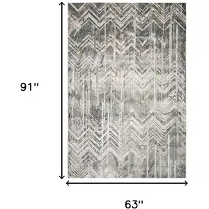 Photo of Grey Polyester or  Viscose Rug
