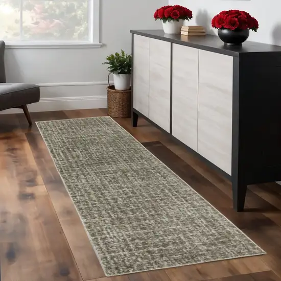 8' Brown And Beige Geometric Distressed Runner Rug Photo 1